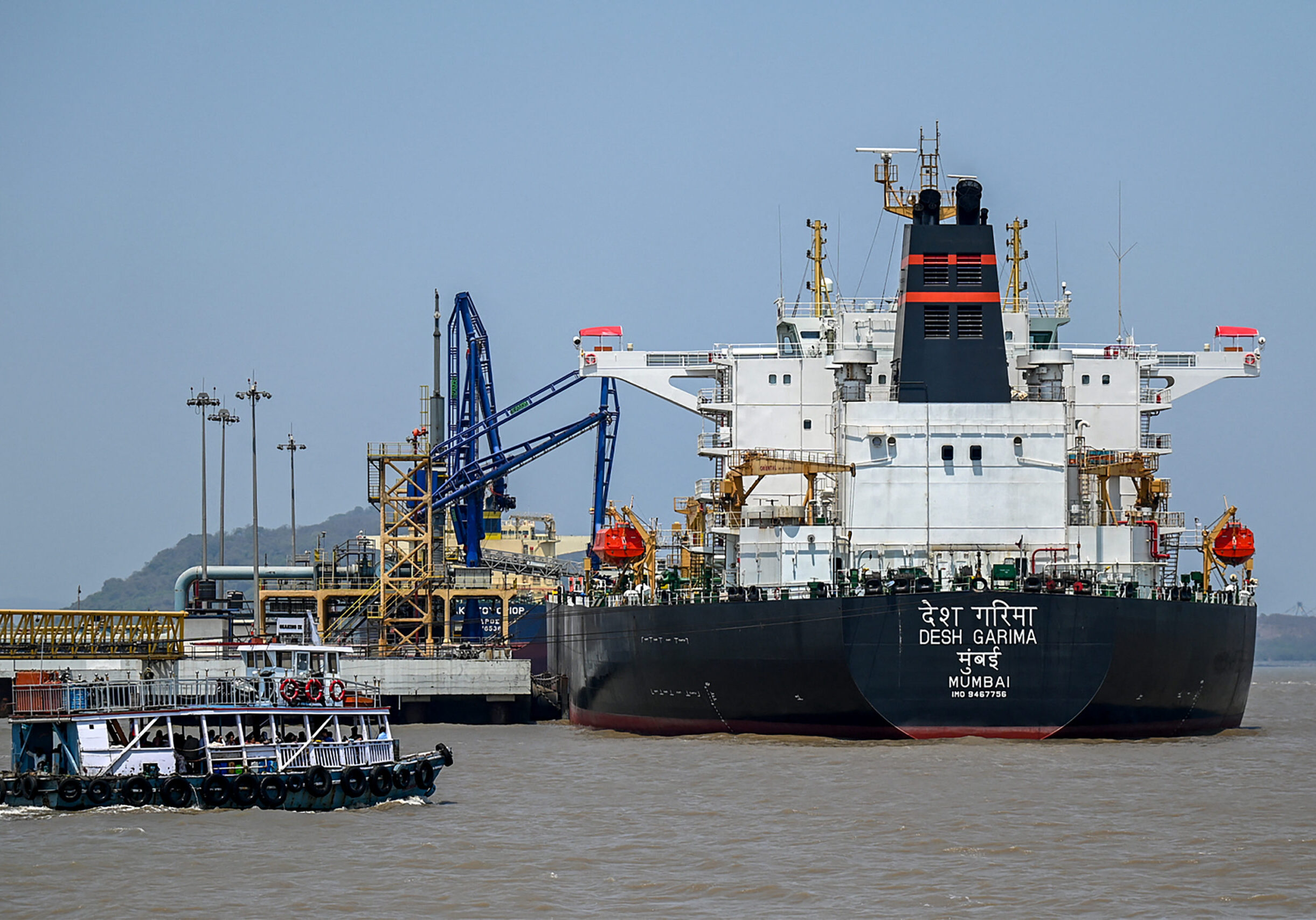 Desh Garima, an Indian-flagged tanker carrying crude oil that transited through the Strait of Hormuz, is seen docked at an offloading terminal along the coast in Mumbai on April 30, 2026. India, the world's third-largest oil buyer, normally sources about half of its crude through the Strait of Hormuz, a vital waterway that has seen only a trickle of traffic since the United States and Israel launched attacks on Iran on February 28. (Photo by Punit PARANJPE / AFP via Getty Images)